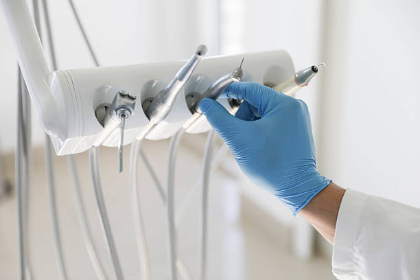 Professional Tooth Extraction technician working in Stallings, NC